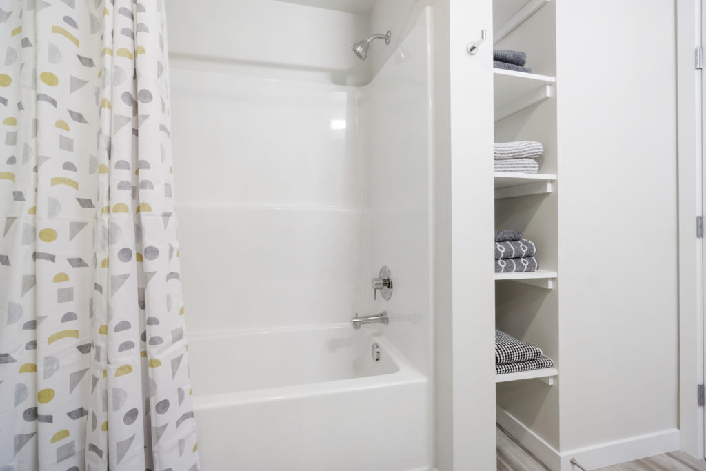 Bathroom tub and bathroom shelving