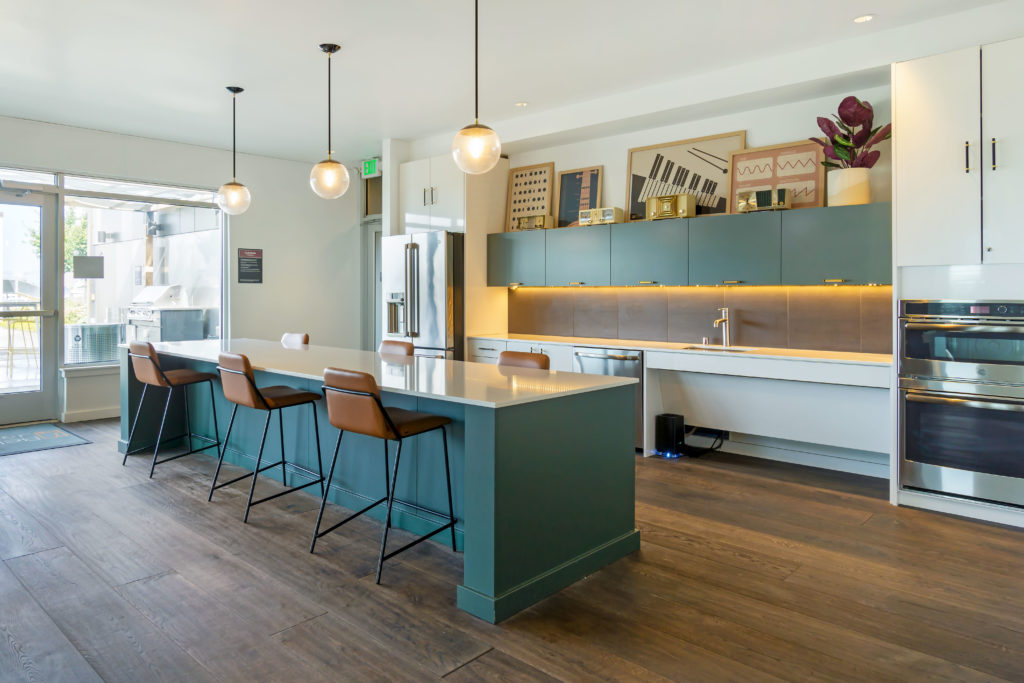 Clubhouse kitchen with bar and seating