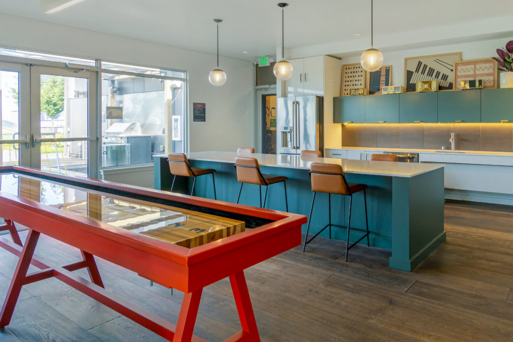 Clubhouse kitchen with bar and seating