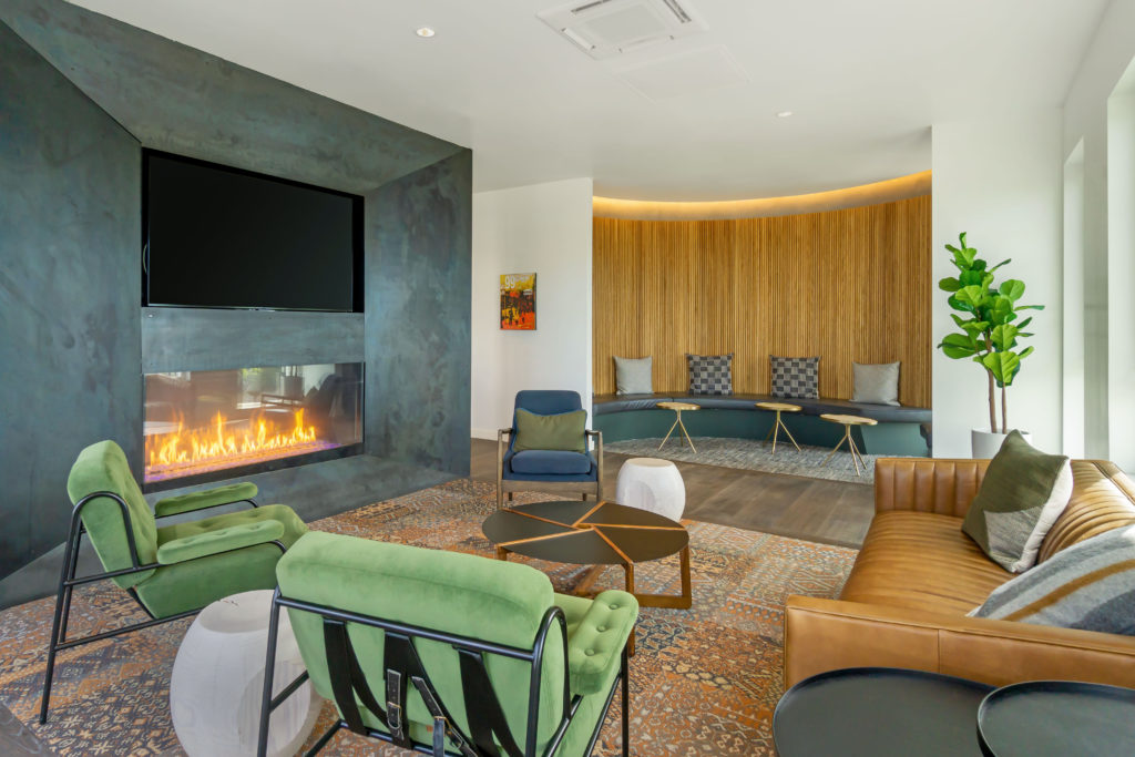 Clubhouse seating around a fireplace